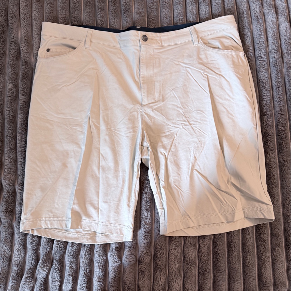 Adidas Golf Men’s light khaki shorts.
